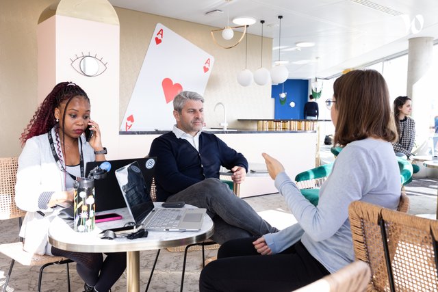 "One of those moments we love: when teams get together in the lively coworking" - Wojo